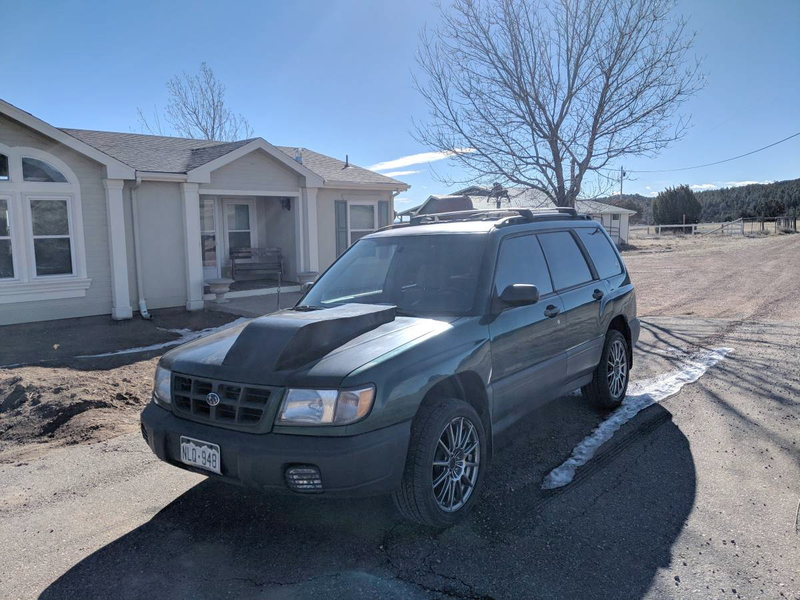 Illustration for article titled At $3,500, Will This Supercharged 1999 Subaru Forester Blow Your Mind?